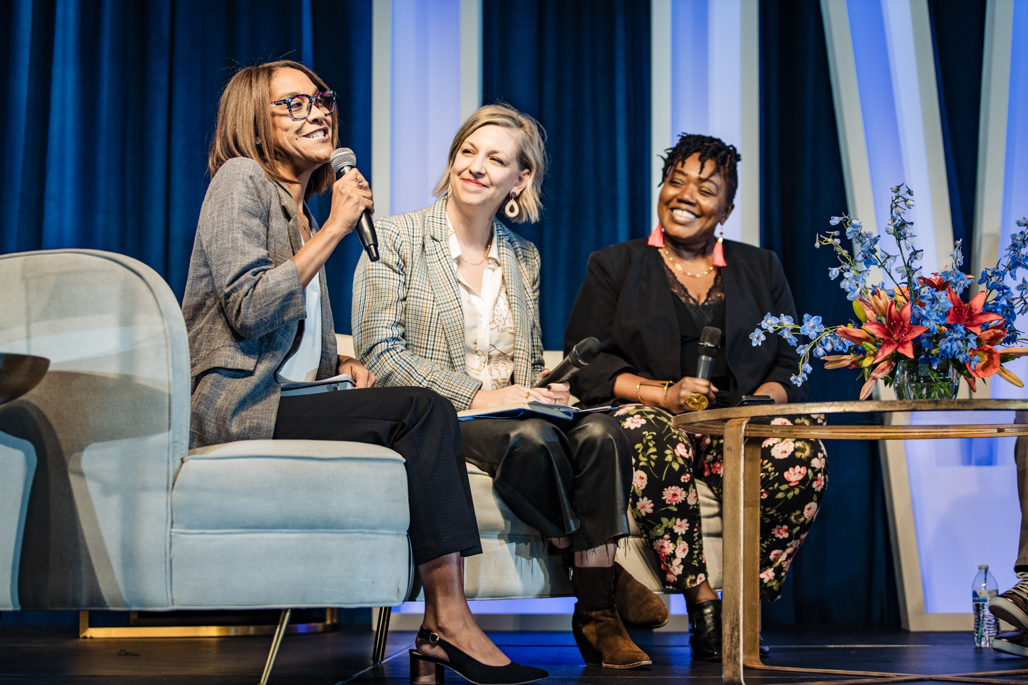 Laura Click, Mika Moser, and Dawn Cornelius on stage at BrainTrustLIVE 2024.